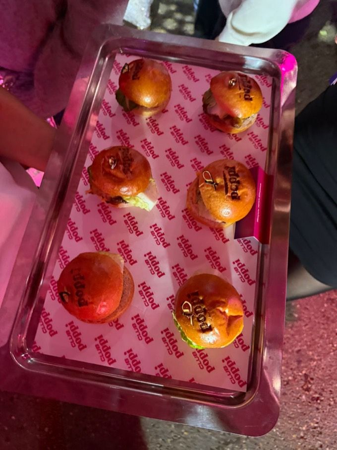 Poppi-branded sliders served on a tray at the Club Poppi launch party in London