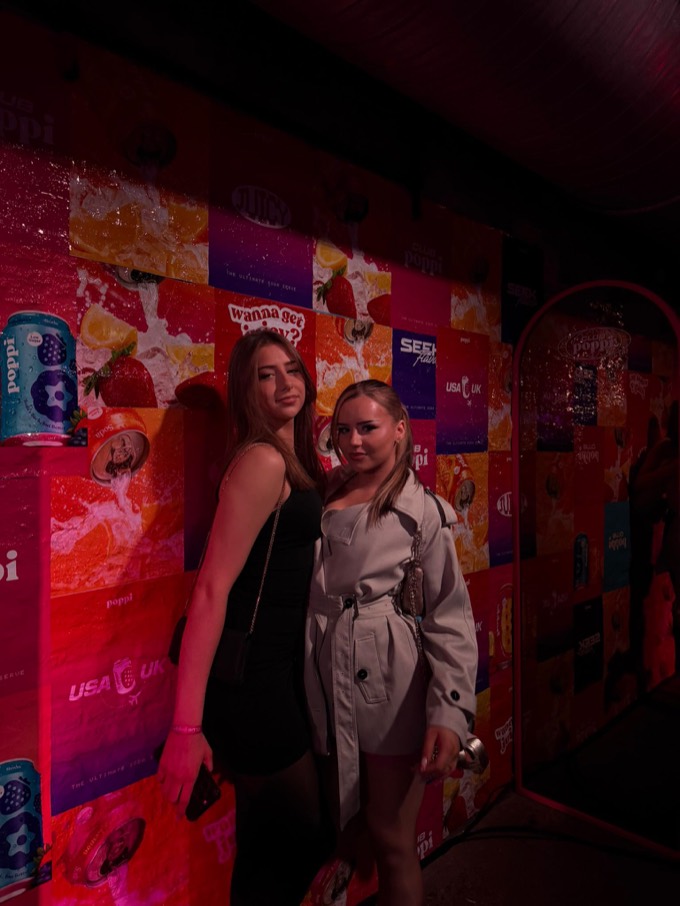 Two creators at the Club Poppi launch party in London